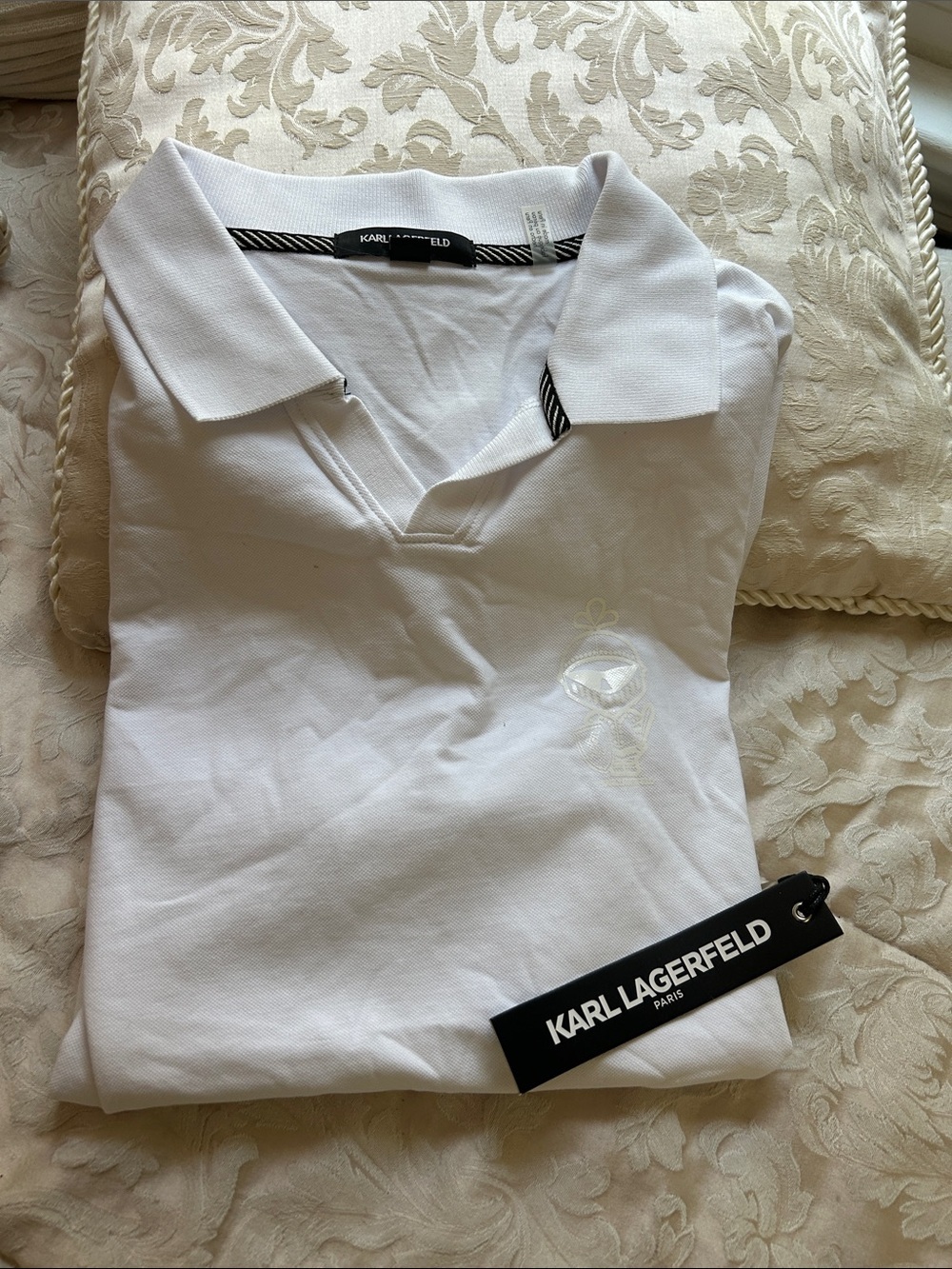 NWT. Karl Lagerfeld Men's White Polo with Subtle Embroidery. Medium.